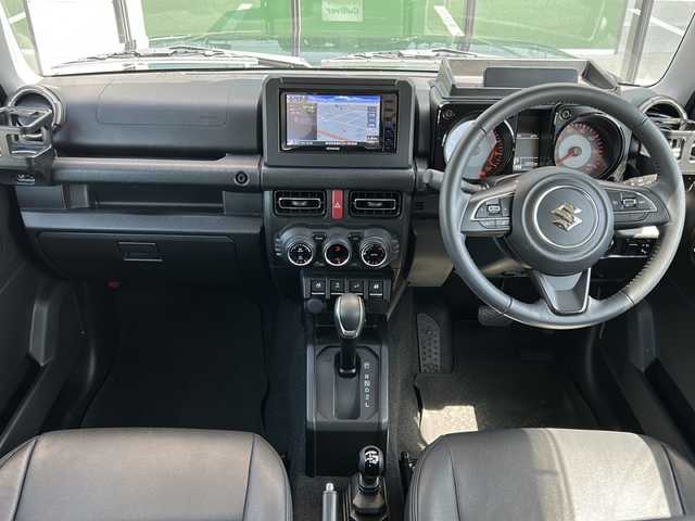 スズキ ジムニー XC 福岡県 2022(令4)年 2.3万km ブルーイッシュブラックパール3 社外メモリナビ/（AM/FM/CD/DVD/BT/フルセグTV）/クルーズコントロール/シートヒーター/背面タイヤ/衝突被害軽減システム/横滑り防止装置/シートカバー有/アイドリングストップ/プッシュスタートボタン/スマートキー/純正LEDヘッドライト/純正１６インチアルミホイール/フロアマット/盗難防止装置/ETC