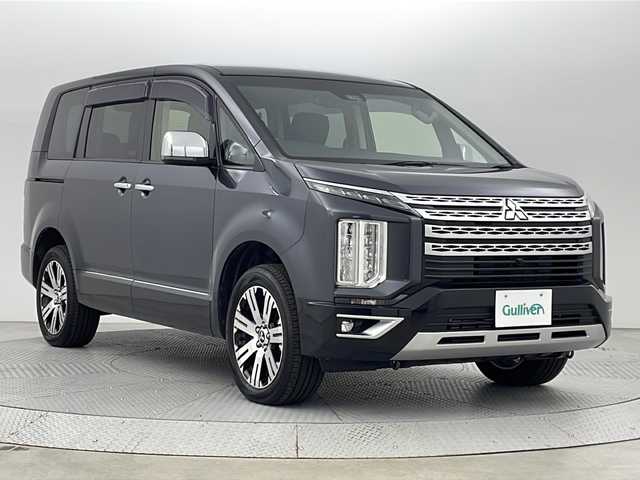 三菱 デリカＤ：５ 新潟県 2022(令4)年 1.6万km グラファイトグレーメタリック/ブラックマイカ 4WD/社外ナビ/　　CD/DVD/BT/iPod/SD/アラウンドビューモニター/両側パワースライドドア/パワーバックドア/レーダークルーズコントロール/LEDオートライト/オートマチックハイビーム/パワーシート/シートヒーター/純正18インチアルミホイール/ステアリングスイッチ/パドルシフト/ブラインドスポットモニター/ステアリングヒーター/アイドリングストップ/スマートキー/ETC