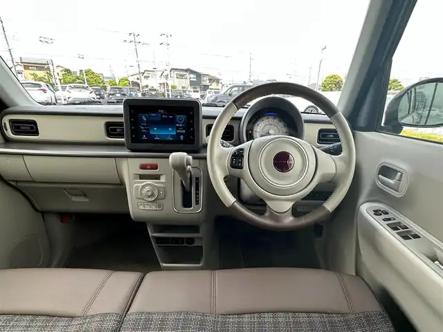 スズキ ラパン ＬＣ L 千葉県 2023(令5)年 0.6万km フォーンベージュM 純正ディスプレイオーディオ/(BT/FM/AM)/バックカメラ/衝突被害軽減システム/車線逸脱警報/横滑り防止装置/アイドリングストップ/LEDヘッドライト/オートライト/ウィンカーミラー/電動格納ミラー/社外14インチAW/シートヒーター/シートリフター/プッシュスタート/スマートキー/フロアマット/スペアキー/取扱説明書/保証書