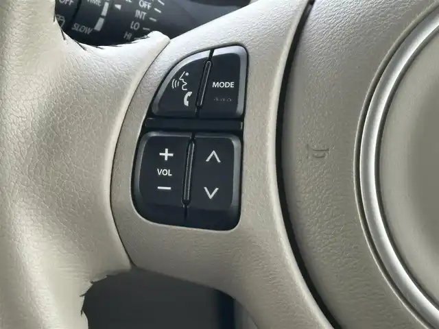スズキ ラパン ＬＣ L 千葉県 2023(令5)年 0.6万km フォーンベージュM 純正ディスプレイオーディオ/(BT/FM/AM)/バックカメラ/衝突被害軽減システム/車線逸脱警報/横滑り防止装置/アイドリングストップ/LEDヘッドライト/オートライト/ウィンカーミラー/電動格納ミラー/社外14インチAW/シートヒーター/シートリフター/プッシュスタート/スマートキー/フロアマット/スペアキー/取扱説明書/保証書