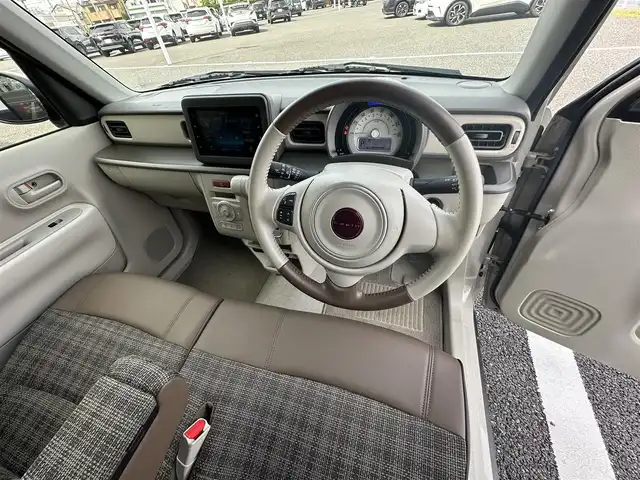 スズキ ラパン ＬＣ L 千葉県 2023(令5)年 0.6万km フォーンベージュM 純正ディスプレイオーディオ/(BT/FM/AM)/バックカメラ/衝突被害軽減システム/車線逸脱警報/横滑り防止装置/アイドリングストップ/LEDヘッドライト/オートライト/ウィンカーミラー/電動格納ミラー/社外14インチAW/シートヒーター/シートリフター/プッシュスタート/スマートキー/フロアマット/スペアキー/取扱説明書/保証書