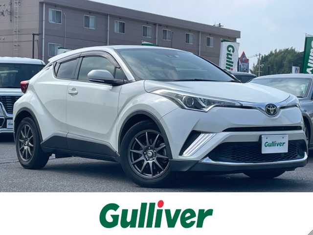 トヨタ Ｃ－ＨＲ S－T 広島県 2019(平31)年 5.1万km ホワイトパールクリスタルシャイン ワンオーナー/純正SDナビ(NSZT-W68T)/　（Bluetooth/フルセグテレビ/CD/DVD/AM/FM）/レーダークルーズコントロール/SPORT ABELIA 17インチアルミホイール/純正フロアマット/バックカメラ/LEDヘッドライト/オートマチックハイビーム/オートライト/横滑り防止装置/レーンキープアシスト/盗難防止装置/衝突被害軽減システム/W+サイドエアバッグ/カーテンエアバック/スマートキー/保証書/取扱説明書