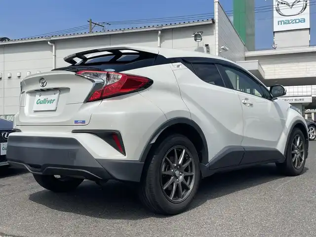 トヨタ Ｃ－ＨＲ S－T 広島県 2019(平31)年 5.1万km ホワイトパールクリスタルシャイン ワンオーナー/純正SDナビ(NSZT-W68T)/　（Bluetooth/フルセグテレビ/CD/DVD/AM/FM）/レーダークルーズコントロール/SPORT ABELIA 17インチアルミホイール/純正フロアマット/バックカメラ/LEDヘッドライト/オートマチックハイビーム/オートライト/横滑り防止装置/レーンキープアシスト/盗難防止装置/衝突被害軽減システム/W+サイドエアバッグ/カーテンエアバック/スマートキー/保証書/取扱説明書