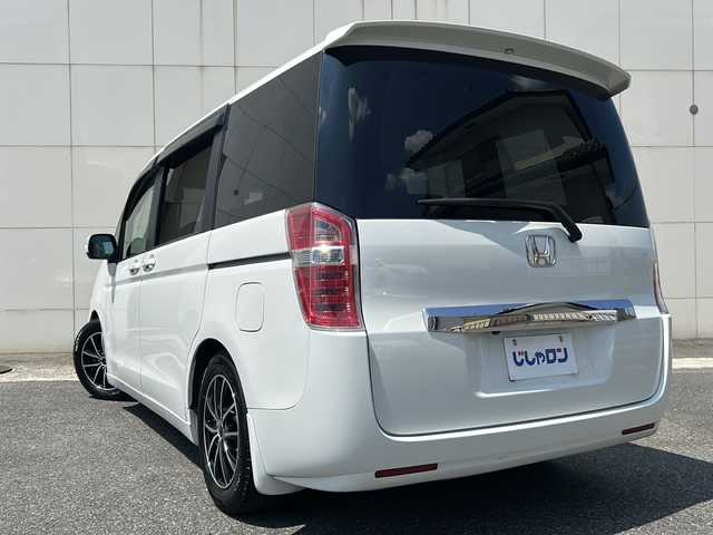 ホンダ ステップワゴン G インターナビコンフォートセレ 埼玉県 2013(平25)年 10.6万km ホワイトオーキッドパール (株)IDOMが運営する【じしゃロン熊谷店】の自社ローン専用車両になりますこちらは現金またはオートローンご利用時の価格です。自社ローンご希望の方は別途その旨お申付け下さい/純正HDDナビ（TV/CD/DVD/FM/AM)/ワンセグテレビ/ハーフレザーシートカバー/クルーズコントロール/２列目シート跳ね上げ/３列目シート床下格納/バックモニター/両側パワースライドドア/ETC/アイドリングストップ/純正フロアマット/LEDオートライト/社外アルミホイール/ドアバイザー/USB入力端子/横滑り防止装置/ABS/スペアキー