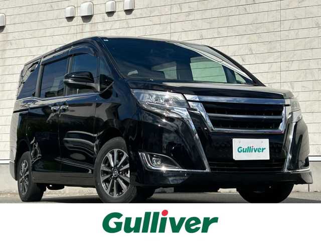 トヨタ エスクァイア Xi 山形県 2018(平30)年 9.2万km ブラック 禁煙車/ワンオーナー/4WD/社外メモリーナビ/・フルセグTV/AM/FM/DVD/Bluetooth/クルーズコントロール/アイドリングストップ/プリクラッシュセーフティ/先行車発進告知/車線逸脱警報/横滑り防止装置/盗難防止装置/LEDヘッドライト/オートライト/オートハイビーム/フロントフォグランプ/片側パワースライドドア/フリップダウンモニター/寒冷地仕様/純正フロアマット/純正ドアバイザー/ETC/冬タイヤ積み込み