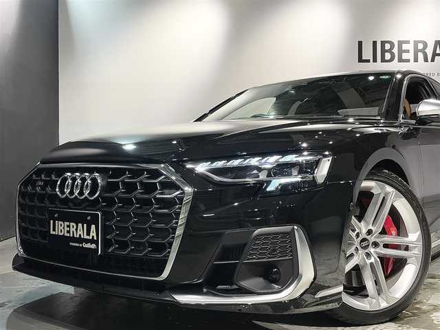 アウディ アウディ Ｓ８ 道央・札幌 2023(令5)年 0.2万km ミトスブラックメタリック ワンオーナー/パノラマサンルーフ/コンフォートパッケージ/・インディビジュアル電動シート(リヤ)/・リヤシートリモート/・シートベンチレーション マッサージ機能(フロント/リヤ)/・Bang&Olufsen3Dサウンド(17スピーカー)/・デジタルマトリクスLEDヘッドライト/・マトリクスLEDインテリアライト/プレディクティブアクティブサスペンション/リヤスポーツディファレンシャル/フルレザーパッケージ/バルコナレザーシート/フロントシート電動調整機能/シートヒーター(全席)/MMIナビゲーション/TVチューナー/ワイヤレスチャージング/バーチャルコックピットプラス/ヘッドアップディスプレイ/マルチカラーアンビエントライティング/4ゾーンデラックスオートマチックエアコンディショナー/サラウンドビューカメラ/アダプティブドライブアシスト/アウディアクティブレーンアシスト/アウディプレセンスフロント/リヤ/フロントクロストラフィックアシスト/アウディサイドアシスト/パークアシスト