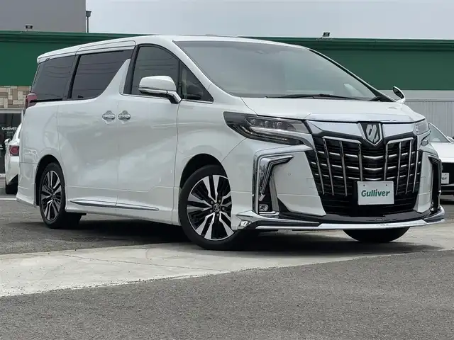 トヨタ アルファード S Cパッケージ 徳島県 2021(令3)年 2.5万km ホワイトパールクリスタルシャイン トヨタセーフティセンス　/モデリスタフルエアロ　/サンルーフ　/三眼LEDヘッドライト/LEDフォグランプ/バックモニター　/レザーシート/クール＆シートヒーター/クリアランスソナー/シーケンシャルウィンカーミラー/モデリスタＦグリルカバー　/モデリスタシグネーチャーイルミネーション　/ウッドコンビハンドル/プッシュスタート/スマートキー/電気式パーキングブレーキ/オートホールド/デジタルインナーミラー　/ブラインドスポットモニター/ビルトインＥＴＣ　/社外フロアマット/AC100V100Wコンセント