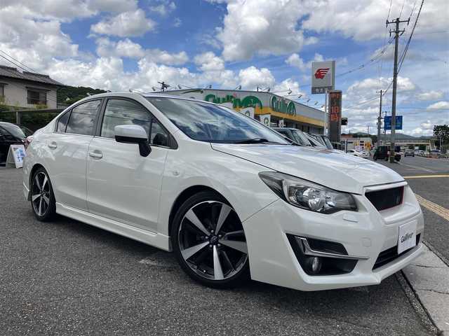 スバル インプレッサ Ｇ４ 1．6i－L 広島県 2015(平27)年 7.7万km クリスタルホワイトP 社外ナビ・フルセグTV/Bluetooth/HIDライト/ブリッツ車高調/柿本マフラー/カーボントランクスポイラー/バックカメラ/ETC/スマートキー/純正OPグリル