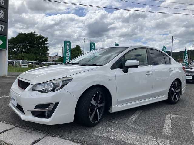 スバル インプレッサ Ｇ４ 1．6i－L 広島県 2015(平27)年 7.7万km クリスタルホワイトP 社外ナビ・フルセグTV/Bluetooth/HIDライト/ブリッツ車高調/柿本マフラー/カーボントランクスポイラー/バックカメラ/ETC/スマートキー/純正OPグリル