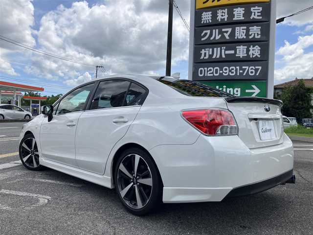 スバル インプレッサ Ｇ４ 1．6i－L 広島県 2015(平27)年 7.7万km クリスタルホワイトP 社外ナビ・フルセグTV/Bluetooth/HIDライト/ブリッツ車高調/柿本マフラー/カーボントランクスポイラー/バックカメラ/ETC/スマートキー/純正OPグリル