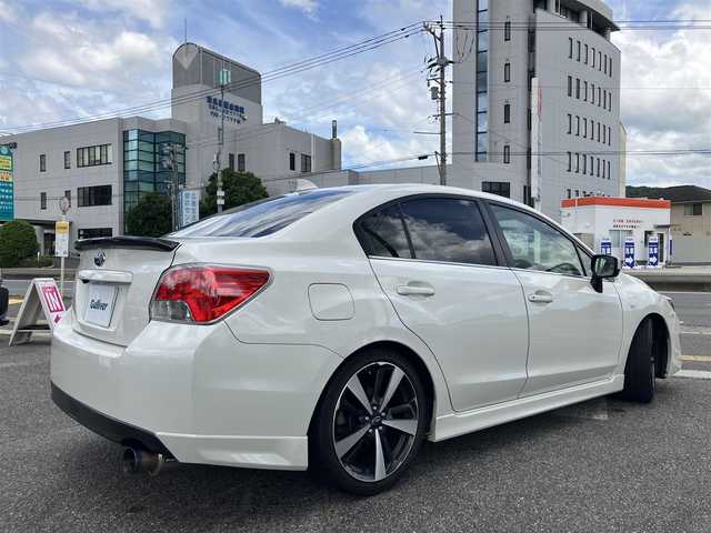 スバル インプレッサ Ｇ４ 1．6i－L 広島県 2015(平27)年 7.7万km クリスタルホワイトP 社外ナビ・フルセグTV/Bluetooth/HIDライト/ブリッツ車高調/柿本マフラー/カーボントランクスポイラー/バックカメラ/ETC/スマートキー/純正OPグリル
