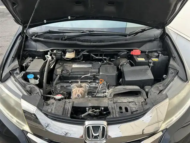 ホンダ オデッセイ アブソルート EX 佐賀県 2014(平26)年 2.6万km クリスタルブラックパール CTBA/ブラインドスポットインフォメーション/クルーズコントロール/純正ナビ/・バックカメラ/・フルセグTV/BT/CD/DVD/ALPINEフリップダウンモニター/純正18インチAW/両側パワースライドドア/ハーフレザーシート/パワーシート/オットマン/LEDヘッドライト/オートライト/フォグランプ/本革巻きステアリング/パドルシフト/ETC/プッシュスタート/スペアキー×１/保証書/取扱説明書