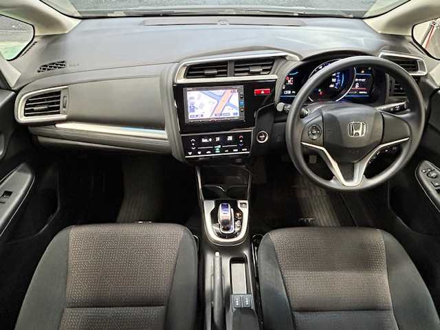 ホンダ フィット ハイブリット Fパッケージ コンフォートED 宮城県 2016(平28)年 12.1万km プレミアムディープモカパール 特別仕様車/ワンオーナー/ハイブリッド/純正メモリナビ/・CD/SD/BT/ワンセグTV/バックカメラ/ステアリングスイッチ/運転席/助手席シートヒーター/プラズマクラスター/アームレスト付センターコンソールボックス/純正キャップ付きスチール＆ノーマルタイヤ/社外アルミ＆スタッドレス積込/アイドリングストップ/プッシュスタート/スマートキー/スペアキー/保証書/取扱説明書