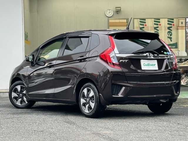 ホンダ フィット ハイブリット Fパッケージ コンフォートED 宮城県 2016(平28)年 12.1万km プレミアムディープモカパール 特別仕様車/ワンオーナー/ハイブリッド/純正メモリナビ/・CD/SD/BT/ワンセグTV/バックカメラ/ステアリングスイッチ/運転席/助手席シートヒーター/プラズマクラスター/アームレスト付センターコンソールボックス/純正キャップ付きスチール＆ノーマルタイヤ/社外アルミ＆スタッドレス積込/アイドリングストップ/プッシュスタート/スマートキー/スペアキー/保証書/取扱説明書