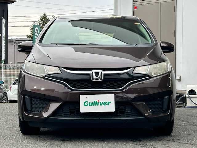 ホンダ フィット ハイブリット Fパッケージ コンフォートED 宮城県 2016(平28)年 12.1万km プレミアムディープモカパール 特別仕様車/ワンオーナー/ハイブリッド/純正メモリナビ/・CD/SD/BT/ワンセグTV/バックカメラ/ステアリングスイッチ/運転席/助手席シートヒーター/プラズマクラスター/アームレスト付センターコンソールボックス/純正キャップ付きスチール＆ノーマルタイヤ/社外アルミ＆スタッドレス積込/アイドリングストップ/プッシュスタート/スマートキー/スペアキー/保証書/取扱説明書