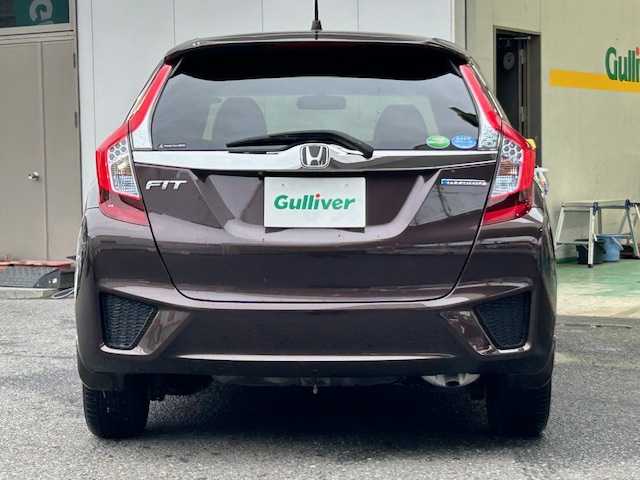 ホンダ フィット ハイブリット Fパッケージ コンフォートED 宮城県 2016(平28)年 12.1万km プレミアムディープモカパール 特別仕様車/ワンオーナー/ハイブリッド/純正メモリナビ/・CD/SD/BT/ワンセグTV/バックカメラ/ステアリングスイッチ/運転席/助手席シートヒーター/プラズマクラスター/アームレスト付センターコンソールボックス/純正キャップ付きスチール＆ノーマルタイヤ/社外アルミ＆スタッドレス積込/アイドリングストップ/プッシュスタート/スマートキー/スペアキー/保証書/取扱説明書