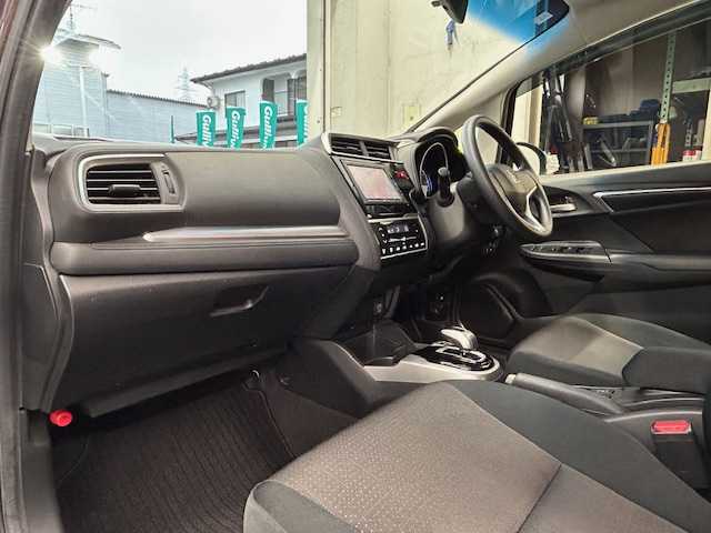 ホンダ フィット ハイブリット Fパッケージ コンフォートED 宮城県 2016(平28)年 12.1万km プレミアムディープモカパール 特別仕様車/ワンオーナー/ハイブリッド/純正メモリナビ/・CD/SD/BT/ワンセグTV/バックカメラ/ステアリングスイッチ/運転席/助手席シートヒーター/プラズマクラスター/アームレスト付センターコンソールボックス/純正キャップ付きスチール＆ノーマルタイヤ/社外アルミ＆スタッドレス積込/アイドリングストップ/プッシュスタート/スマートキー/スペアキー/保証書/取扱説明書