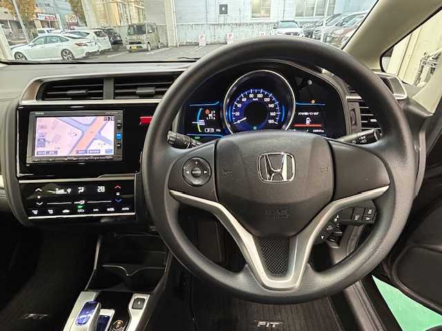 ホンダ フィット ハイブリット Fパッケージ コンフォートED 宮城県 2016(平28)年 12.1万km プレミアムディープモカパール 特別仕様車/ワンオーナー/ハイブリッド/純正メモリナビ/・CD/SD/BT/ワンセグTV/バックカメラ/ステアリングスイッチ/運転席/助手席シートヒーター/プラズマクラスター/アームレスト付センターコンソールボックス/純正キャップ付きスチール＆ノーマルタイヤ/社外アルミ＆スタッドレス積込/アイドリングストップ/プッシュスタート/スマートキー/スペアキー/保証書/取扱説明書