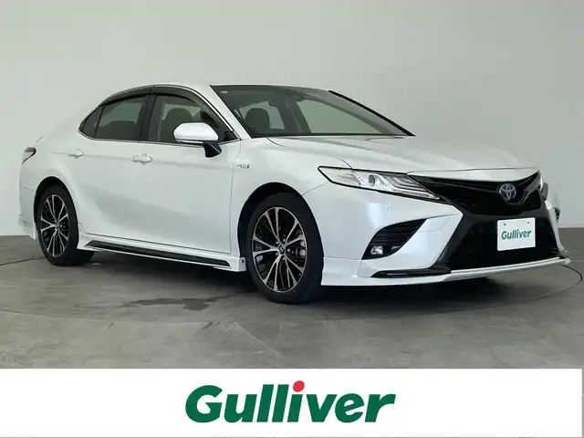 トヨタ カムリ WS 大分県 2019(令1)年 2.7万km プラチナホワイトパールマイカ 純正ナビ/CD/DVD/フルセグ/BT/AUX/電子パーキング/パワーシートD席/ETC/TVキャンセラー/トヨタセーフティーセンス/・衝突軽減ブレーキ/・レーダークルーズコントロール/・BSM/・オートハイビーム/・レーンキープアシスト/・コーナーセンサー/TRDエアロ(F/S/R)/純正アルミホイール