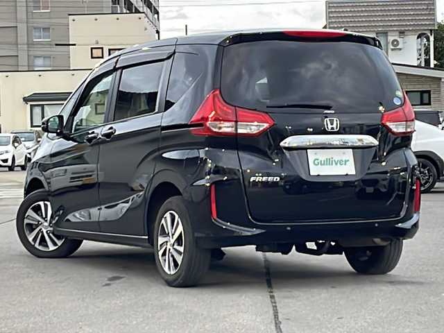 ホンダ フリード G ホンダセンシング 道北・旭川 2021(令3)年 2.7万km クリスタルブラックパール /ワンオーナー//寒冷地仕様//禁煙車//純正ナビ /BT/SD/USB/フルセグ//両側パワースライドドア/急アクセル抑制機能/ACC/トラフィックジャムアシスト/CMBS/先行車発進お知らせ機能/路外逸脱抑制機能//革巻きステアリング//ステアリングスイッチ//ハーフレザーシート//前席シートヒーター//オートエアコン//オートライト//LEDヘッドライト//純正フロアマット//ドライブレコーダー//フロントガラスデアイサー//バックカメラ//ドアバイザー//スペアキー//エンジンスターター//ドアミラーウィンカー//アイドリングストップ//ETC//サンシェード//取扱説明書//保証書