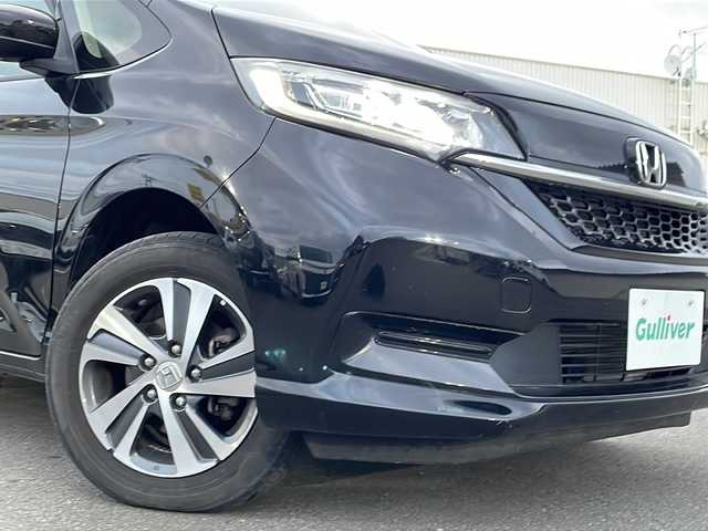 ホンダ フリード G ホンダセンシング 道北・旭川 2021(令3)年 2.7万km クリスタルブラックパール /ワンオーナー//寒冷地仕様//禁煙車//純正ナビ /BT/SD/USB/フルセグ//両側パワースライドドア/急アクセル抑制機能/ACC/トラフィックジャムアシスト/CMBS/先行車発進お知らせ機能/路外逸脱抑制機能//革巻きステアリング//ステアリングスイッチ//ハーフレザーシート//前席シートヒーター//オートエアコン//オートライト//LEDヘッドライト//純正フロアマット//ドライブレコーダー//フロントガラスデアイサー//バックカメラ//ドアバイザー//スペアキー//エンジンスターター//ドアミラーウィンカー//アイドリングストップ//ETC//サンシェード//取扱説明書//保証書