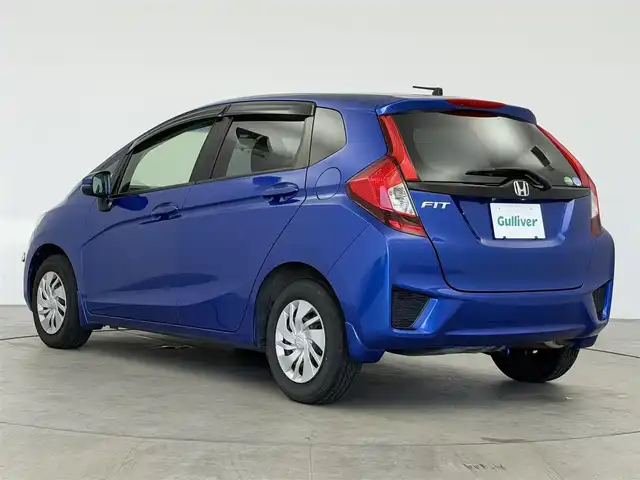 ホンダ フィット 13G Lパッケージ 愛知県 2015(平27)年 6万km ブリリアントスポーティブルーメタリック2トーン ・シティーブレーキアクティブ【CTBA】/・横滑り防止装置/・純正ナビ/（Bluetooth/ワンセグ/AM/FM)/・純正ドライブレコーダ/・アイドリングストップ/・革巻きステア/・オートLEDヘッドライト/・シートリフター/・電動格納ミラー/・ウィンカーミラー/・ステアスイッチ/・ドアバイザー/・スペアキー