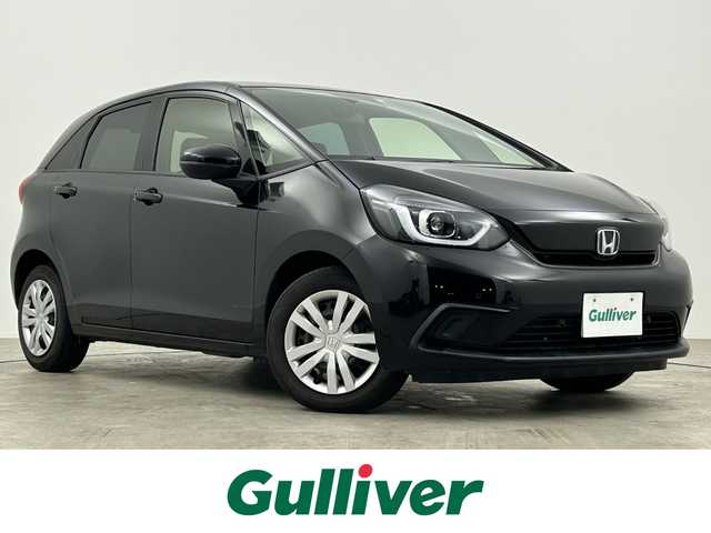 ホンダ フィット ベーシック 大阪府 2020(令2)年 6.6万km クリスタルブラックパール ワンオーナー/禁煙車/ホンダセンシング搭載/・衝突軽減ブレーキ（CMBS）/・誤発進抑制機能/・後方誤発進抑制機能/・近距離衝突軽減ブレーキ/・歩行者事故低減ステアリング/・路外逸脱抑制機能/・ACC（アダプティブクルーズコントロール）/・LKAS（車線維持支援システム）/・オートハイビーム/・先行車発進お知らせ機能/・標識認識機能/純正ナビ　型式：VXM-205Ci/【Bluetooth、CD、FM/AM】/ステアリングスイッチ/電動パーキング/オートホールド機能/アイドリングストップ/横滑り防止装置/電動格納ミラー/純正フロアマット/オートライト/LEDヘッドライト/保証書、取説