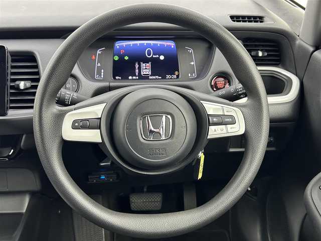 ホンダ フィット ベーシック 大阪府 2020(令2)年 6.6万km クリスタルブラックパール ワンオーナー/禁煙車/ホンダセンシング搭載/・衝突軽減ブレーキ（CMBS）/・誤発進抑制機能/・後方誤発進抑制機能/・近距離衝突軽減ブレーキ/・歩行者事故低減ステアリング/・路外逸脱抑制機能/・ACC（アダプティブクルーズコントロール）/・LKAS（車線維持支援システム）/・オートハイビーム/・先行車発進お知らせ機能/・標識認識機能/純正ナビ　型式：VXM-205Ci/【Bluetooth、CD、FM/AM】/ステアリングスイッチ/電動パーキング/オートホールド機能/アイドリングストップ/横滑り防止装置/電動格納ミラー/純正フロアマット/オートライト/LEDヘッドライト/保証書、取説