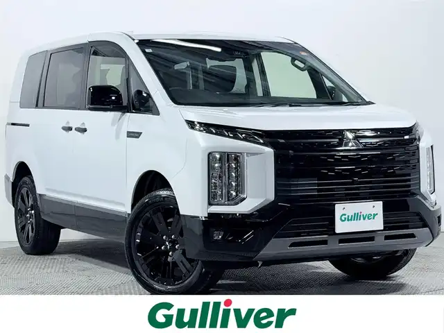 三菱 デリカＤ：５ シャモニー 大阪府 2025(令7)年 0.1千km 白Ⅱ 登録済未使用車　純正１１ｉｎｃナビ　ＢＳＭ　レーダークルーズＣ　衝突軽減Ｂ　レーンアシスト　両側電動ドア　電動リアゲート　ＡＣ１００Ｖ　ハンドルヒーター　クリアランスソナー　パドルシフト　ＨＤＭＩ