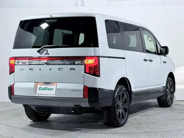 三菱 デリカＤ：５ シャモニー 大阪府 2025(令7)年 0.1千km 白Ⅱ 登録済未使用車　純正１１ｉｎｃナビ　ＢＳＭ　レーダークルーズＣ　衝突軽減Ｂ　レーンアシスト　両側電動ドア　電動リアゲート　ＡＣ１００Ｖ　ハンドルヒーター　クリアランスソナー　パドルシフト　ＨＤＭＩ
