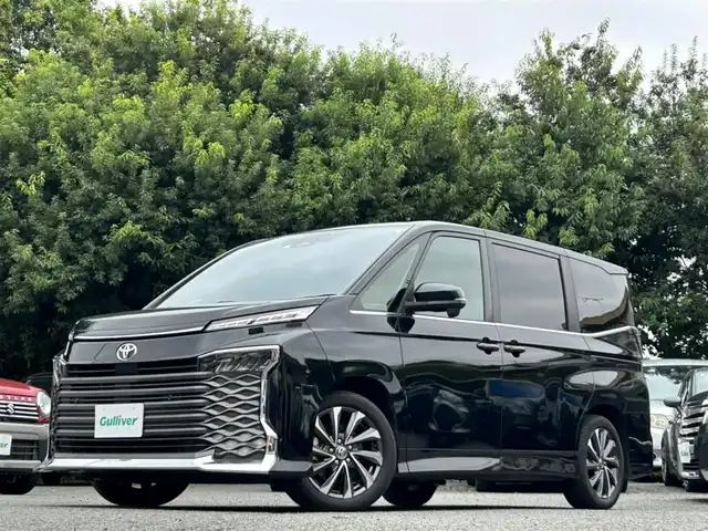 トヨタ ヴォクシー S－Z 東京都 2023(令5)年 3.8万km アティチュードブラックマイカ ワンオーナー/10.5型ディスプレイオーディオナビ+バックカメラ/DVD/フルセグTV/Bluetoothオーディオ/HDMI/USB/AppleCarPlay/AndroidAuto/Miracast/快適利便パッケージHigh/・ハンズフリーデュアルパワースライドドア/・パワーバックドア/・2列目シートヒーター&オットマン/・ステアリングヒーター/ナノイー/ビルトインETC2.0/前後ドライブレコーダー/純正17インチAW/LEDヘッドランプ/Toyota Safety Sense/スマートキー×2
