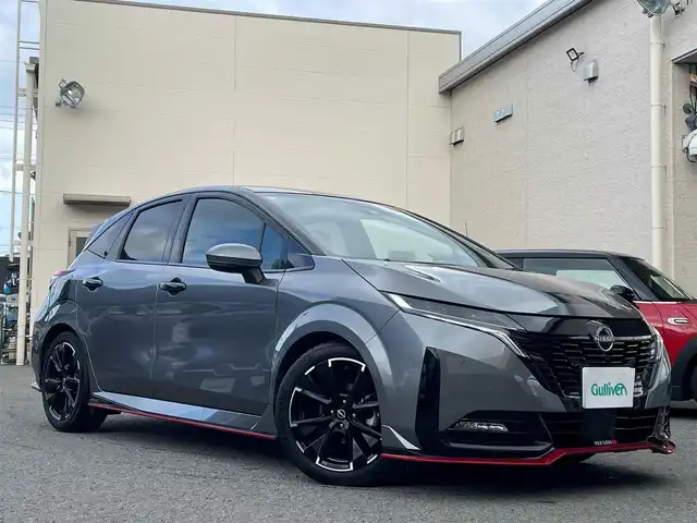 日産 オーラ ニスモ 和歌山県 2022(令4)年 1.7万km ダークメタルグレー/スーパーブラック2トーン 純正ナビ(フルセグTV/FM/AM/USB/Bluetooth)/ワンオーナー/プッシュスタート/ドライブレコーダー/アイドリングストップ/クルーズコントロール/全周囲カメラ/プロパイロット/ブラインドスポットモニター/シートヒーター/ハンドルヒーター/HDMI/ETC2.0/LEDオートライト/インテリジェントルームミラー/ワイヤレス充電器/純正ニスモエアロ/純正アルミホイール/純正フロアマット/取扱説明書/保証書
