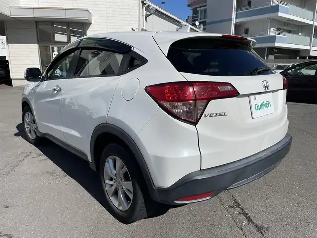 ホンダ ヴェゼル X ホンダセンシング 静岡県 2016(平28)年 14.5万km ホワイトオーキッドパール ワンオーナー/純正メモリナビ・フルセグTV/DVD/CD/USB/SD/Bluetooth/バックカメラ/HONDA SENSING/・アダプティブクルーズコントロール（ACC）/・衝突軽減ブレーキ（CMBS）/・車線維持支援システム（LKAS）/・誤発進抑制機能/・先行車発進お知らせ機能/・オートハイビーム/・標識認識機能/純正16インチアルミホイール/LEDヘッドライト/ビルトインETC/スマートキー/プッシュスタート/新車時保証書/取扱説明書