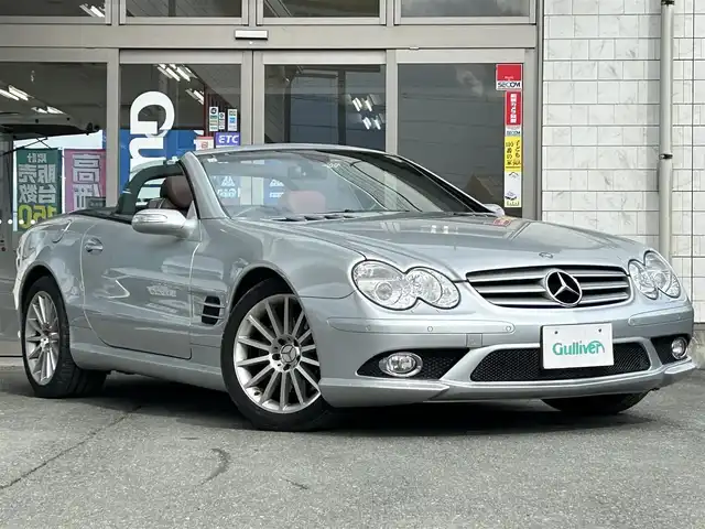 メルセデス・ベンツ ＳＬ３５０ 岩手県 2007(平19)年 5万km イリジウムシルバー ・社外ナビ/・型番AVZC-2N0007/・フルセグ/・AM/FM/AUX/CD/DVD/Bluetooth/・バックカメラ/・電動オープン/・レザーシート/・スマートキー/・ABS/・オートライト/・MTモード付AT/・パドルシフト/・クルーズコントロール/・革巻きステアリング/・パワーシート（D＋N）/・シートヒーター（D＋N）/・シートメモリ（D＋N）/・ETC/・コーナーセンサー/・純正フロアマット/・保証書/・取扱説明書