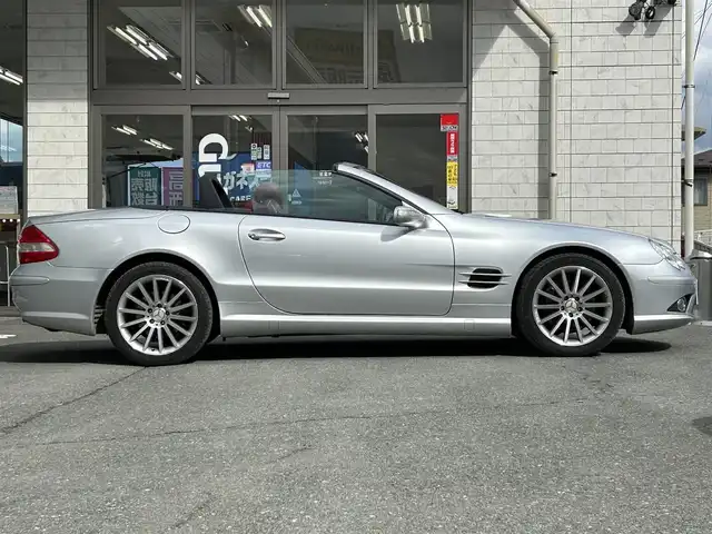メルセデス・ベンツ ＳＬ３５０ 岩手県 2007(平19)年 5万km イリジウムシルバー ・社外ナビ/・型番AVZC-2N0007/・フルセグ/・AM/FM/AUX/CD/DVD/Bluetooth/・バックカメラ/・電動オープン/・レザーシート/・スマートキー/・ABS/・オートライト/・MTモード付AT/・パドルシフト/・クルーズコントロール/・革巻きステアリング/・パワーシート（D＋N）/・シートヒーター（D＋N）/・シートメモリ（D＋N）/・ETC/・コーナーセンサー/・純正フロアマット/・保証書/・取扱説明書