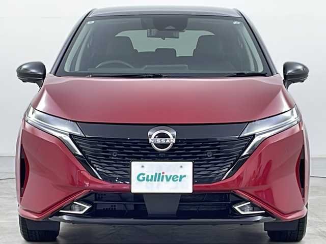 日産 オーラ G FOUR レザーエディション 道央・札幌 2024(令6)年 1.3万km ガーネットレッド/スーパーブラック 2トーン ・4WD/・社外ナビ&TV&CD&DVD&BT&SD/・全方位カメラ/・エマージェンシーブレーキ/・ステアリングヒーター/・前席シートヒーター/・レザーシート/・デジタルインナーミラー/・LEDヘッドライト/・オートライト/・スマートキー/・スペアキー/・サマータイヤのみ積込