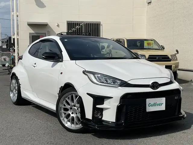 トヨタ ＧＲヤリス RS 和歌山県 2020(令2)年 6.7万km スーパーホワイトⅡ 純正8インチディスプレイモニター/T-Connect/Bluetooth/バックカメラ/GRフルエアロ/社外オーバーフェンダー/社外19インチアルミホイール(アネーロコラソン)/ブラインドスポットモニター/カーボン調ルーフ/18インチ純正アルミホイール積み込み/冬タイヤ積み込み/ドアバイザー/社外ミラー型ドライブレコーダー/ETC/衝突軽減装置/レーンキープアシスト/取扱説明書/保証書