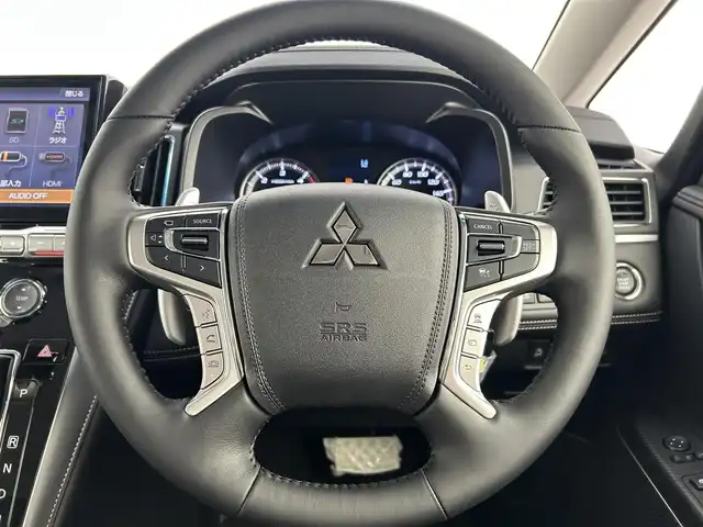 三菱 デリカＤ：５ シャモニー 千葉県 2025(令7)年 0.1千km ホワイトダイヤモンド オリジナルナビ取付パッケージ＋リアモニター取付パッケージ/登録済未使用車/４WD/三菱e-Assist/・衝突被害軽減ブレーキシステム/・誤発進抑制機能（前進時）/・車線逸脱警報システム［LDW］/・レーダークルーズコントロールシステム/・オートマチックハイビーム/両側パワースライドドア/パワーバックドア/デリカD:5専用アルパイン１１型メモリナビ/・型番：EX11NX/・CD/DVD/USB/HDMI/Bluetooth/フルセグTV/・アラウンドビューモニター/革巻きステアリング/・ステアリングスイッチ/・ステアリングヒーター/・パドルシフト/ハーフレザーシート/・DNシートヒーター/電子パーキング/・ブレーキホールド/純正18インチAW/オートライト/・LEDヘッドライト/・LEDフォグランプ