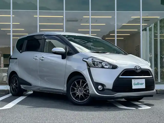 トヨタ シエンタ G 愛媛県 2016(平28)年 4.4万km シルバーM ワンオーナー/柿本改マフラー(純正マフラー有)/純正ナビ(NSZT-W66T)/・Bluetooth/・CD/DVD/フルセグTV/バックカメラ/ドライビング・セーフティ・センサーZERO(304V)/ETC/ドライブレコーダー/両側パワースライドドア/3列シート/社外フロアマット/社外15インチAW(SMACK)/トヨタセーフティセンス/衝突被害軽減システム/レーンキープアシスト/オートライト/オートマチックハイビーム/アイドリングストップ/プッシュスタート/スペアキー/取扱説明書/保証書