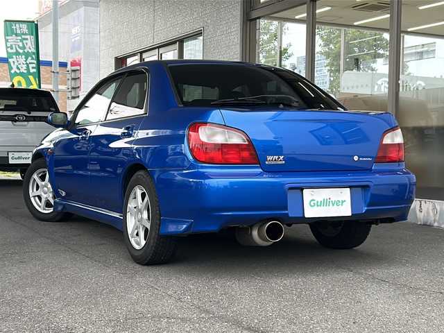 スバル インプレッサ ＷＲＸ NB 岐阜県 2001(平13)年 11.1万km WRブルーマイカ ワンオーナー /TEIN車高調/社外マフラー/社外ハンドル/社外15インチAW/（サマータイヤ付純正AW車載）/HIDヘッドライト/フォグランプ/社外Egスターター/スペアキー/ドアバイザー/純正フロアマット/取扱説明書/新車時保証書