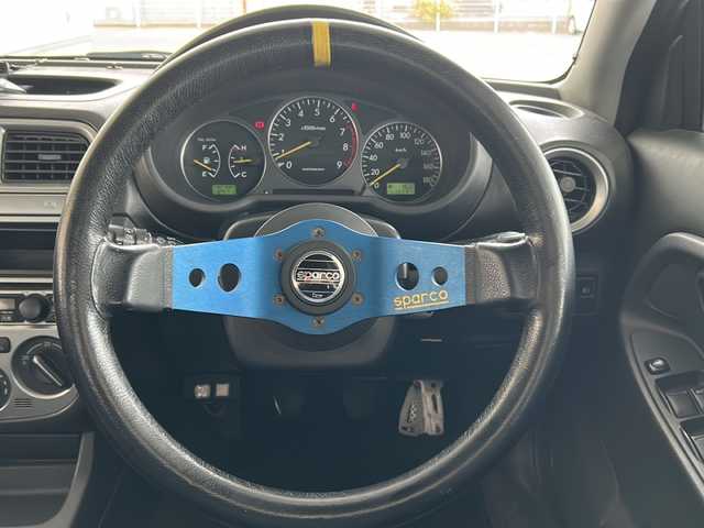 スバル インプレッサ ＷＲＸ NB 岐阜県 2001(平13)年 11.1万km WRブルーマイカ ワンオーナー /TEIN車高調/社外マフラー/社外ハンドル/社外15インチAW/（サマータイヤ付純正AW車載）/HIDヘッドライト/フォグランプ/社外Egスターター/スペアキー/ドアバイザー/純正フロアマット/取扱説明書/新車時保証書