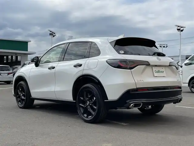 ホンダ ＺＲ－Ｖ ハイブリッド e:HEV Z 東京都 2025(令7)年 0.1万km プラチナホワイトパール 純正９型ワイドディスプレイナビ＆フルセグ　/・BluetoothAudio&USB/・AppleCarPlay&AndroidAuto/アラウンドビューモニター　/ブラインドスポットモニター　/ＢＯＳＥサウンドシステム　/ハンズフリーパワーバックドア　/ステアリングヒーター　/ワイヤレス充電　/レーダークルーズコントロール/レーザーパワーシート/・前席シートヒーター/・前席パワーシート/・２列目パーソナルUSB/パーキングセンサーシステム/ホンダセンシング/（安全運転支援システム）/・衝突軽減ブレーキ/・歩行車事故低減ステアリング/・車線維持支援システム/・先行車発進お知らせ機能/保証書＆取説