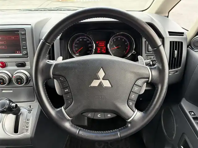 三菱 デリカＤ：５ G－Navi package 三重県 2008(平20)年 11.6万km ディープブラックマイカ ♪４WD/純正ナビ　/　・DVD再生・CD録音・TV/♪バック/左サイドカメラ/♪クルーズコントロール/♪パドルシフト/♪左側パワースライドドア/♪2WD/4WD切り替えスイッチ/♪キーレス/♪HIDヘッドライト/♪オートライト/♪革調シートカバー/♪革巻きステアリング/♪ステアリングスイッチ/♪電動格納ミラー/♪ウィンカーミラー/♪フロアマット/♪リアガラスフィルム施工/♪ドアバイザー/♪スペアタイヤ/♪横滑り防止機能(ASC)
