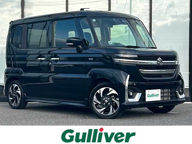 スズキ スペーシア カスタム HYBRID XS 山形県 2024(令6)年 0.4万km ブルーイッシュブラックパール3 禁煙車/4WD/デュアルセンサーブレーキサポートII/アダプティブクルーズコントロール/レーンキープアシスト/横滑り防止装置/オートマチックハイビーム/前方ドライブレコーダー/バックカメラ/純正8インチナビ/（Bluetooth/AM/FM/フルセグ/DVD)/テレビキャンセラー/ヘッドアップディスプレイ/両側パワースライドドア/ステアリングヒーター/ステアリングスイッチ/ハーフレザーシート/前席シートヒーター/ETC/純正アルミホイール/LEDライト/フォグランプ