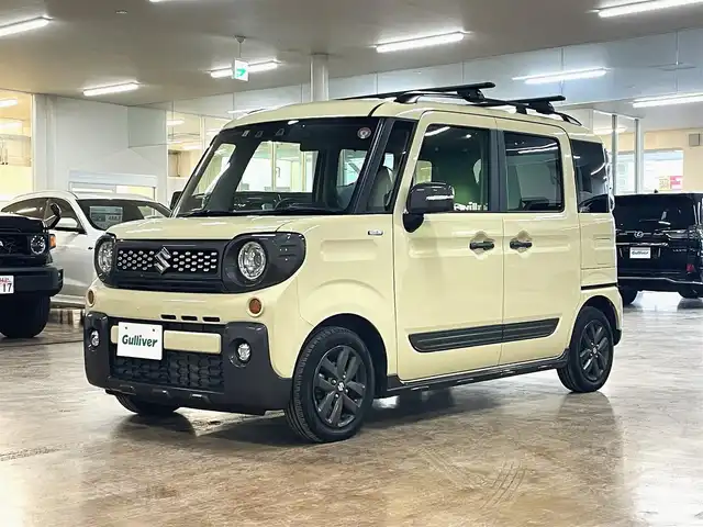 スズキ スペーシア ギア HYBRID XZターボ 道央・札幌 2023(令5)年 1.4万km シフォンアイボリーM ワンオーナー/4WDターボ/衝突軽減ブレーキ/純正14インチAW/ルーフキャリアベース（THULE製）/レーンキープアシスト/横滑り防止/アイドリングストップ/クリアランスソナー/両側パワースライドドア/ヘッドアップディスプレイ/レーダークルーズコントロール/パドルシフト/ディスプレイオーディオ/Bluetooth/CD/DVD/AUX/USB/バックカメラ/ビルトインETC/ドライブレコーダー（前方のみ）/LEDヘッドライト/フォグランプ/スマートキー×2/USBポート×2/シートヒーター（D/N）/サーキュレーター/社外AW付スタッドレスセット積込み/　155/65/14　2022年製6mm/保証書/取扱説明書