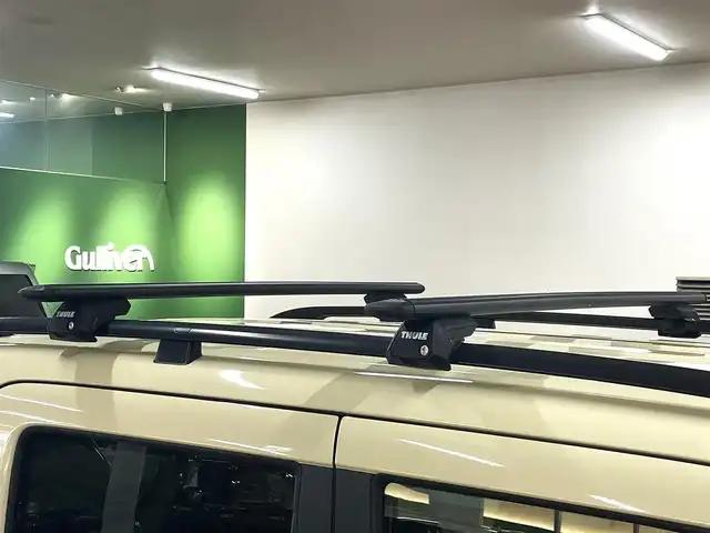 スズキ スペーシア ギア HYBRID XZターボ 道央・札幌 2023(令5)年 1.4万km シフォンアイボリーM ワンオーナー/4WDターボ/衝突軽減ブレーキ/純正14インチAW/ルーフキャリアベース（THULE製）/レーンキープアシスト/横滑り防止/アイドリングストップ/クリアランスソナー/両側パワースライドドア/ヘッドアップディスプレイ/レーダークルーズコントロール/パドルシフト/ディスプレイオーディオ/Bluetooth/CD/DVD/AUX/USB/バックカメラ/ビルトインETC/ドライブレコーダー（前方のみ）/LEDヘッドライト/フォグランプ/スマートキー×2/USBポート×2/シートヒーター（D/N）/サーキュレーター/社外AW付スタッドレスセット積込み/　155/65/14　2022年製6mm/保証書/取扱説明書