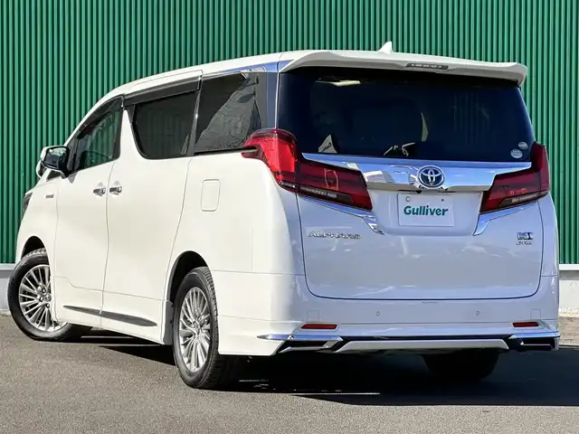 トヨタ アルファードハイブリット G Fパッケージ 宮城県 2018(平30)年 7.2万km ホワイトパールクリスタルシャイン ～メーカーOP～/ツインムーンルーフ/デジタルインナーミラー/インテリジェントクリアランスソナー/3眼LEDヘッドランプセット/・LEDイルミネーション機能付3眼LEDヘッドランプ/・シーケンシャルターンランプ/・アダプティブハイビームシステム/＝＝＝＝＝＝＝＝＝＝＝＝＝＝＝＝＝＝＝＝＝＝＝＝＝/～ディーラーOP～/純正10インチSDナビ/・フルセグ・CD・DVD・SD【録画機能付】・Bluetooth/モデリスタフルエアロ/バックカメラ/ビルドインETC/純正ドアバイザー/純正フロアマット/＝＝＝＝＝＝＝＝＝＝＝＝＝＝＝＝＝＝＝＝＝＝＝＝＝/ワンオーナー/セーフティセンス【予防安全パッケージ】/・プリクラッシュセーフティ/・レーダークルーズコントロール【全車追従機能付】/・オートマチックハイビーム/・レーントレーシングアシスト/・ロードサインアシスト/ベージュ革シート/・エアシート/・パワーシート/・シートヒーター/パワーバックドア/両側電動スライドドア/純正17インチアルミホイール/保証書/取扱説明書/スペアキー/記録簿