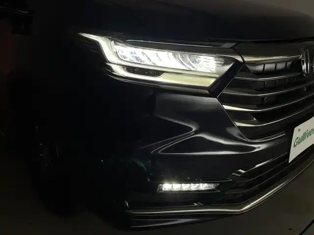 ホンダ オデッセイ ハイブリッド e:HEVアブソルート EX 群馬県 2021(令3)年 2.3万km プレミアムヴィーナスブラックP 本革シート/＝＝＝＝＝/純正10インチナビ/・AM/FM/CD/DVD/SD/フルセグTV/・Bluetooth/USB/HDMI/AppleCarPlay/純正フリップダウンモニター/マルチビューカメラシステム/Hondaスマートパーキングアシスト/ハンズフリーアクセスパワーテールゲート/ジェスチャーコントロール両側パワースライドドア/ホンダセンシング/・衝突軽減ブレーキ（CMBS）/・路外逸脱抑制機能/車線維持支援システム（LKAS）/・誤発進抑制機能/後方誤発進抑制機能/・歩行者事故低減ステアリング/・渋滞追従機能付アダプティブクルーズコントロール/・先行車発進お知らせ機能/標識認識機能/LEDアクティブコーナリングライト/ブラインドスポットインフォメーション/2列目プレミアムクレードルシート/前席パワーシート/シートヒーター/運転席大型アームレスト/AC100V電源/電動パーキングブレーキ/オートブレーキホールド