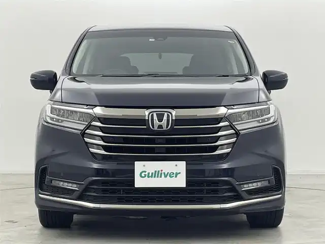ホンダ オデッセイ ハイブリッド e:HEVアブソルート EX 群馬県 2021(令3)年 2.3万km プレミアムヴィーナスブラックP 本革シート/＝＝＝＝＝/純正10インチナビ/・AM/FM/CD/DVD/SD/フルセグTV/・Bluetooth/USB/HDMI/AppleCarPlay/純正フリップダウンモニター/マルチビューカメラシステム/Hondaスマートパーキングアシスト/ハンズフリーアクセスパワーテールゲート/ジェスチャーコントロール両側パワースライドドア/ホンダセンシング/・衝突軽減ブレーキ（CMBS）/・路外逸脱抑制機能/車線維持支援システム（LKAS）/・誤発進抑制機能/後方誤発進抑制機能/・歩行者事故低減ステアリング/・渋滞追従機能付アダプティブクルーズコントロール/・先行車発進お知らせ機能/標識認識機能/LEDアクティブコーナリングライト/ブラインドスポットインフォメーション/2列目プレミアムクレードルシート/前席パワーシート/シートヒーター/運転席大型アームレスト/AC100V電源/電動パーキングブレーキ/オートブレーキホールド