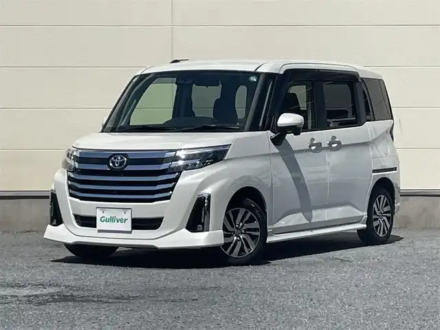 トヨタ ルーミー カスタムG 茨城県 2024(令6)年 0.9万km パールホワイトⅢ ワンオーナー/革巻きステアリング/ステアリングスイッチ/レーダークルーズコントロール/LEDヘッドライト/電子式パーキング/両側パワースライドドア/ETC/社外ナビ/パノラミックビューカメラ/フロアマット/プッシュスタート